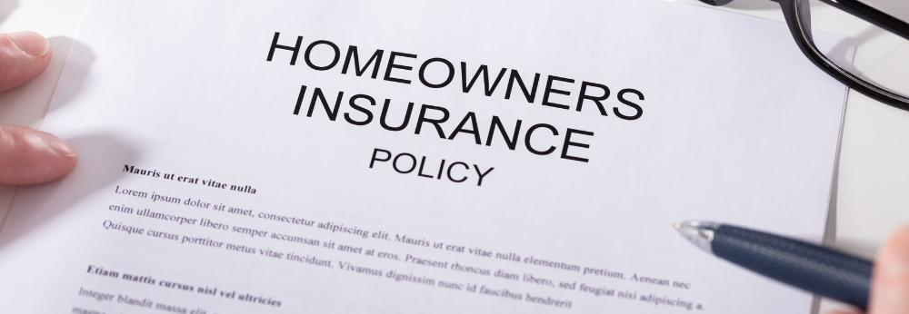 a picture of a printed homeowners insurance policy