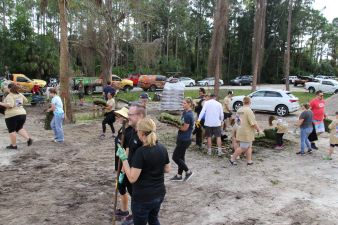 A large number of volunteers working and organizing during the Homes for Our Troops event