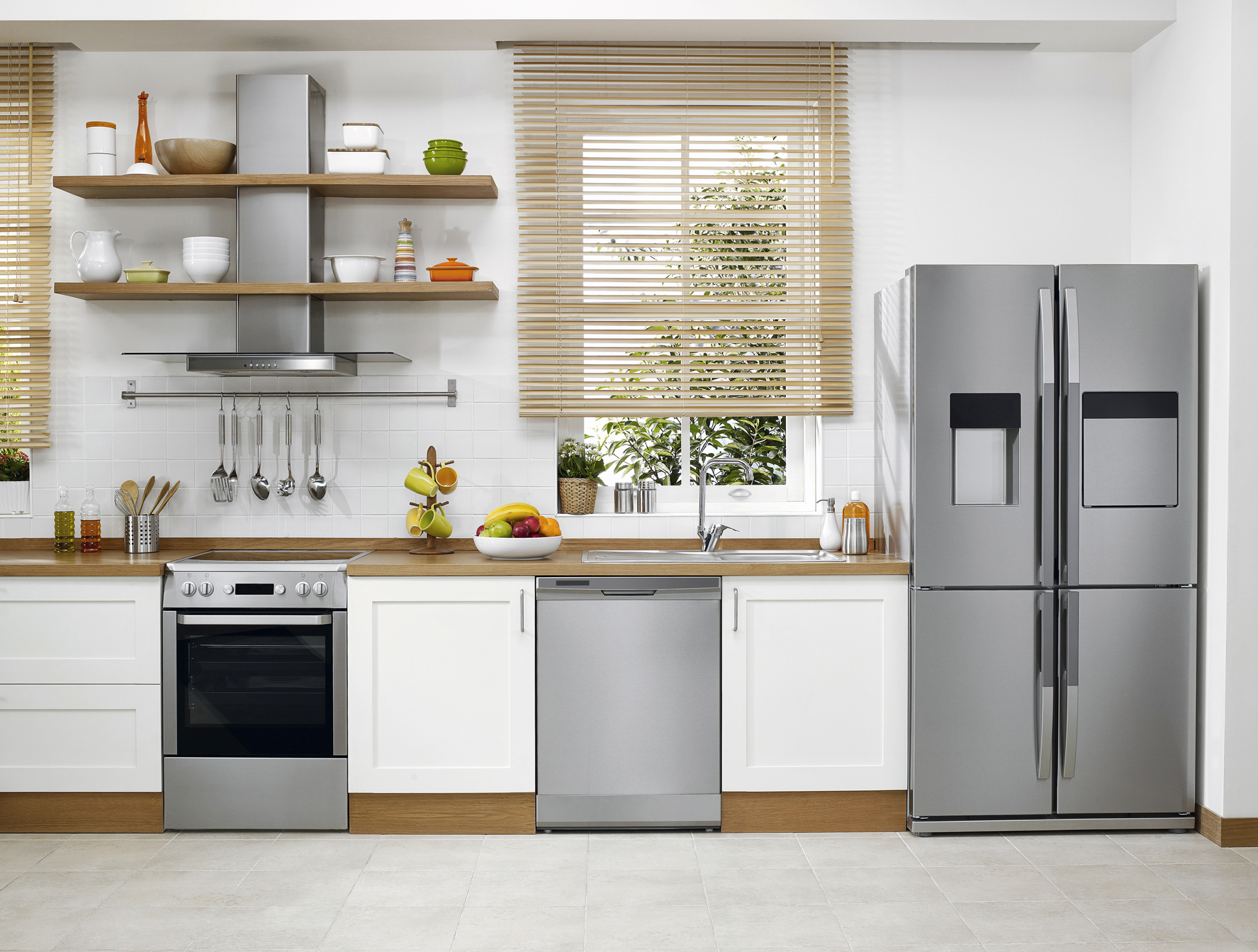 A picture of a traditional kitchen with stainless steel appliances