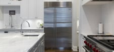 kitchen with refrigerator covered by home warranty